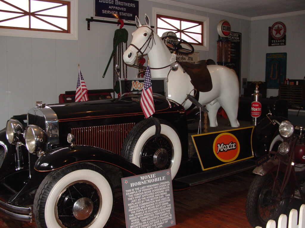Horse-drawn carriage with a Moxie logo